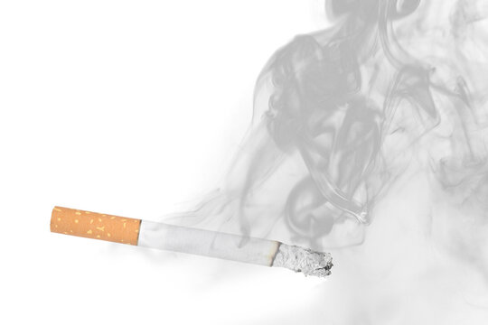 Smoldering cigarette with rising smoke against transparent background