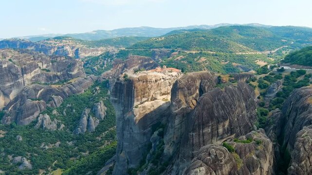 Meteora, Kalabaka, Greece. Monastery of the Holy Trinity at Meteora. Meteora - rocks, up to 600 meters high. There are 6 active Greek Orthodox monasteries listed on the UNESCO list. Drone footage