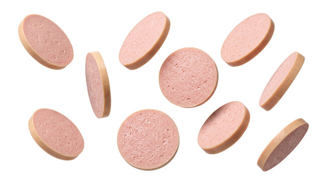 Sliced bologna sausage pieces floating with pieces scattered mid on transparent background