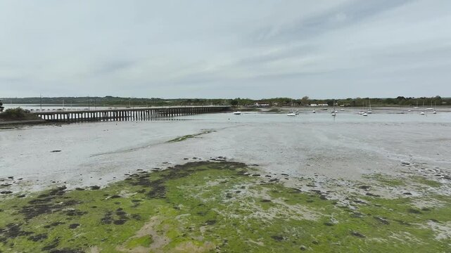 Bridge and Quay to the Hayling Island from a dron at low tide, Havant, Hampshire, England