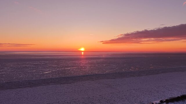 Frozen Bay of Puck near Kuznica at sunset, Hel Peninsula. Poland