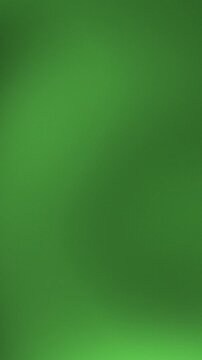 Abstract background featuring a smooth green black gradient with soft glowing light effects and subtle motion. Ideal for technology, nature, or organic themes.