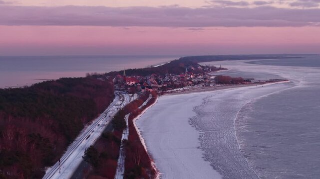 Frozen Bay of Puck near Kuznica at sunset, Hel Peninsula. Poland