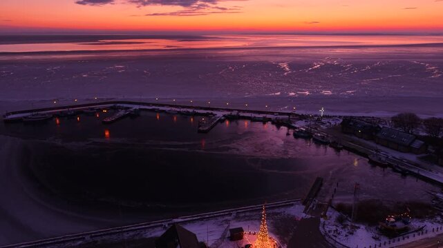 Frozen Bay of Puck near Kuznica at sunset, Hel Peninsula. Poland