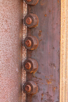 Alleghe, Italy. Rusted steel bolts and corroded metal construction with weathered industrial texture
