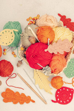 Set of clew of thread for knitting. Crocheted different leaves, handmade, autumn hobby concept