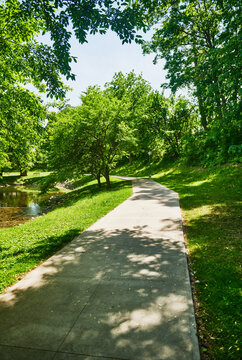 paved walking path along the tranquil ponds in Congress Park, located right in the heart of downtown Saratoga Springs, New York