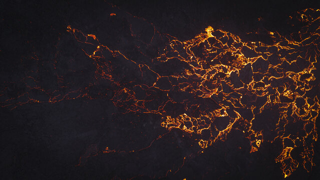 Aerial view of glowing lava flow spreading across dark volcanic rock, capturing the intense heat and textures of an active volcano in Reykjavik, Reykjavikurborg, Iceland.