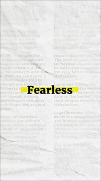 Fearless text - on yellow banner over vintage minimalist white newspaper background