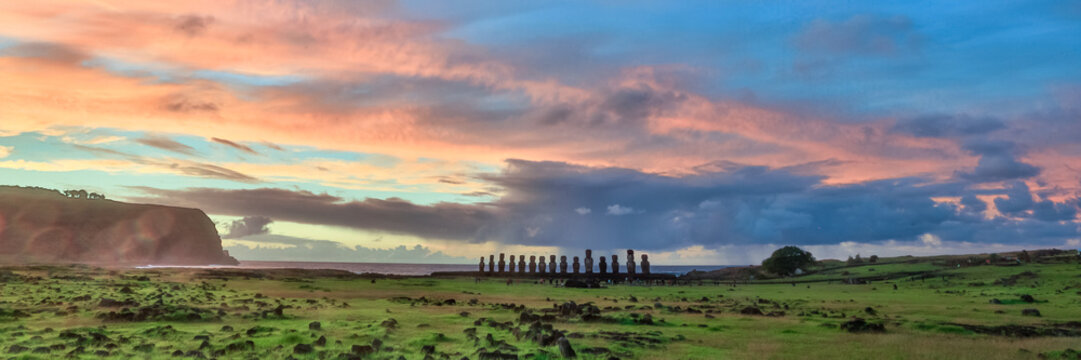 Moai Statues at Ahu Tongariki Standing in a Row Against a Twilight Sky on Easter Island, Valparaiso, Chile