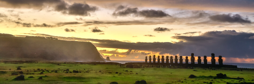 Moai Statues at Ahu Tongariki Standing in a Row Against a Twilight Sky on Easter Island, Valparaiso, Chile