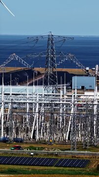 Aerial Drone Industrial Site Solar Panels Energy Generation Sea Background Vertical Google GRQ