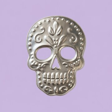 Silver decorative sugar skull mask on pastel purple background
