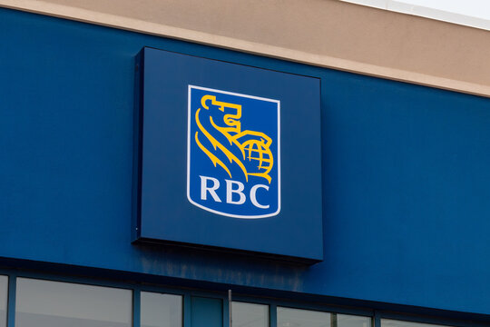 Calgary, Alberta, Canada. August 31, 2026. Low-angle close-up shot of the blue Royal Bank of Canada (RBC) sign on a branch exterior.