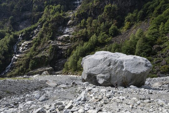 Large boulder lies in the Bavona River riverbed as a result of heavy rock and debris flow on the night of June 29-30, 2024 following heavy rains, hamlet of Fontana, Bavona Valley or Val Bavona, Maggia Valley, Tessin, Switzerland
