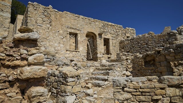 Dilapidated stone walls and arches of a formerly inhabited structure in barren landscape, Lost Place, Abandoned Village, Mikro Chorio, Church of the Assumption of Mary, Zero Waste Island, Tilos, Dodecanese, Greek Islands, Greece