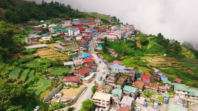 Drone hyperlapse as sunlight breaks through rain clouds over Atok, Benguet