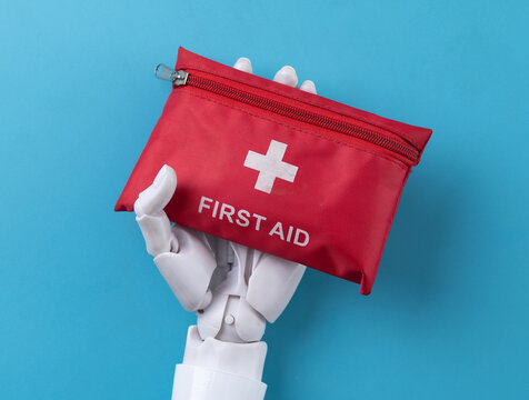 Robot Hands Holding Red First Aid Kit Pouch Concept of AI Medical Support