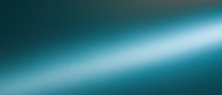 Teal anodised aluminium surface with fine bead blasted texture and soft gradient lighting