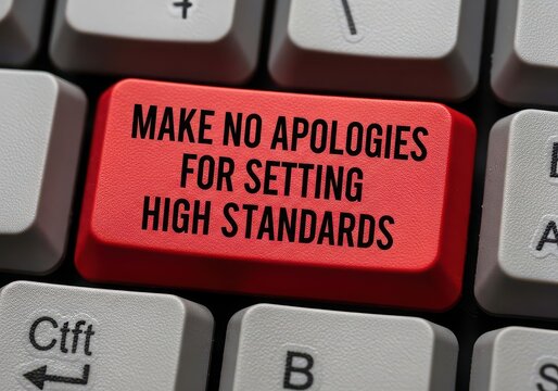 Red keyboard key with make no apologies high standards text
