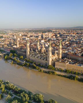 Aerial view of the Cathedral-Basilica of Our Lady of the Pillar situated along the Ebro River in the historic city center of Zaragoza, Aragon, Spain.
