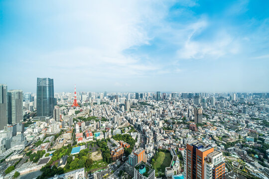 Panoramic aerial view of tokyo tower and cityscape skyline under clear blue sky in Roppongi hills, japan with copy space