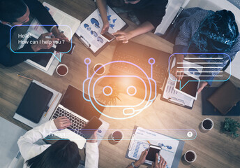 A group of professionals collaborates in a modern workspace, featuring technology, charts, and...