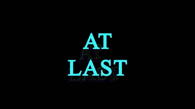 Text AT LAST appearing with cinematic motion in dark background during conceptual reveal for success