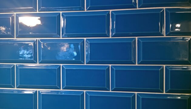 Glossy blue subway tile wall with white grout lines