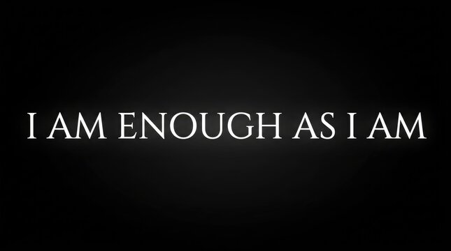 I am enough as I am inspirational quote photo. White glowing typography on dark textured background. Motivational message for personal growth