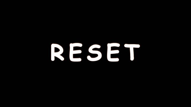 Repeating reset button illuminated against black background during digital concept