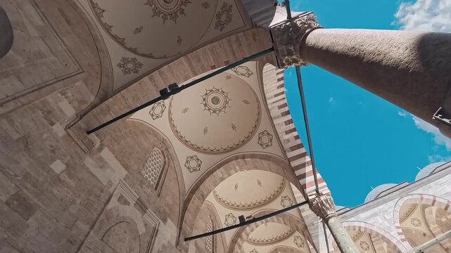 Exploring the archways of a historic mosque
