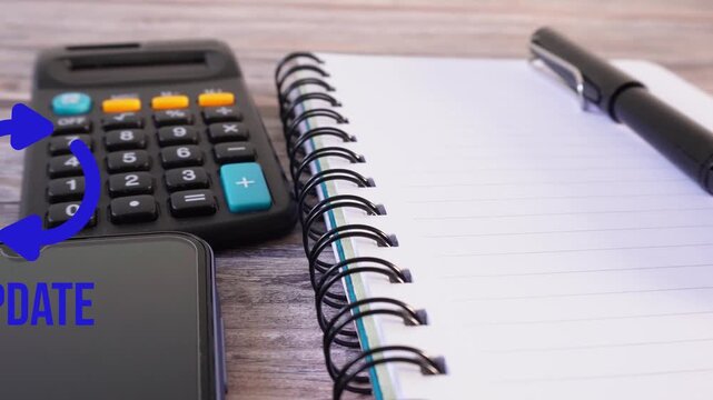 Notebook, pen, calculator, and phone on wooden surface