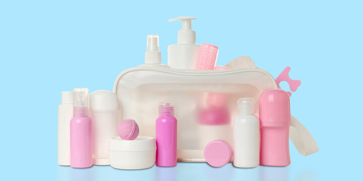 Cosmetics. Cosmetic bottles and jars are neatly arranged inside a stylish toilet bag