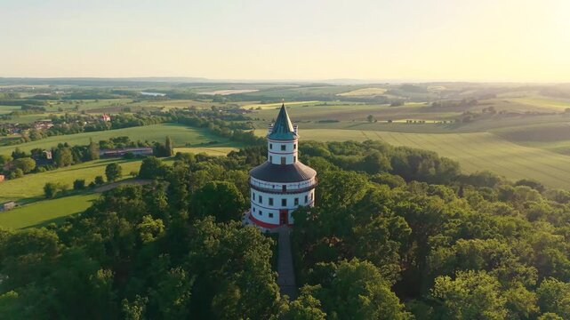Aerial view of the historic Humprecht hunting lodge surrounded by lush forests and rolling fields in Sobotka, Kralovehradecky kraj, Czechia.