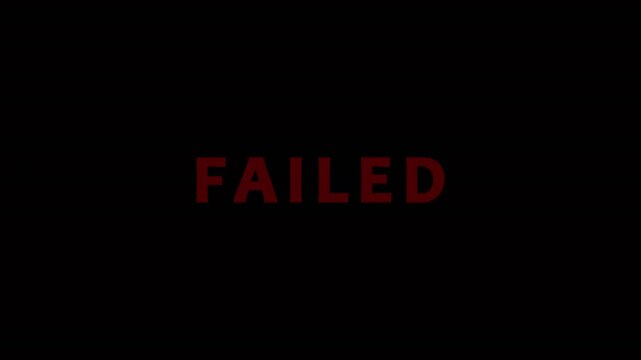 Red FAILED text flashes on black background with cinematic motion and selective focus for concept of business setback