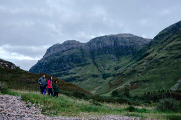 Fototapeta premium Group of friends trekking in Glen Etive, Scotland
