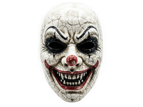 Scary cracked porcelain clown mask isolated on transparent background