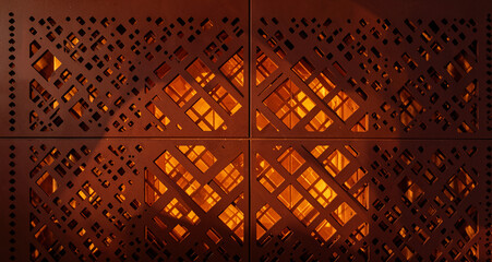 Obraz premium Perforated Copper Exterior Facade Geometric Diamond Cutout Panel