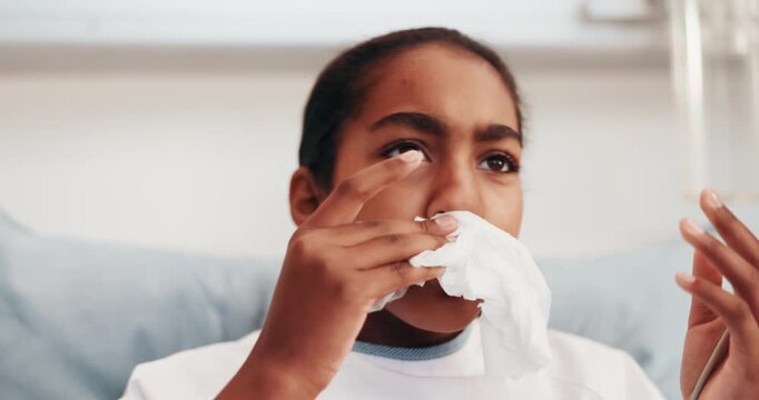 Sick, girl or blowing nose with tissue in clinic for hayfever, illness or viral infection. Child, kid or influenza with toilet paper, cold or flu for medical allergies, virus or sinus in hospital bed