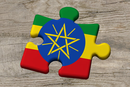3D illustration. Flag of Ethiopia on a jigsaw puzzle pieces on a wood background.