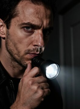 Male Individual To In Late Twenties Early Thirties Short Dark Hair Facial Stubble Signs Of Aging As Fine Lines Around Eyes Forehead