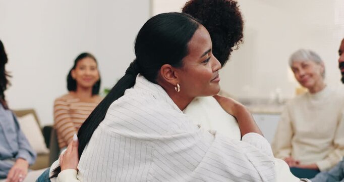 Therapy, group or women in center with hug, understanding or peer empathy in emotional support. Mental health, patient or people with in clinic embrace, encouragement or coping together in counseling