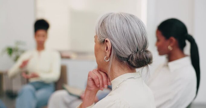 Support group, therapy and woman listening in counseling for coping strategy or healing progress. Mature person, community center and psychology circle for mental health, help and rehabilitation hope
