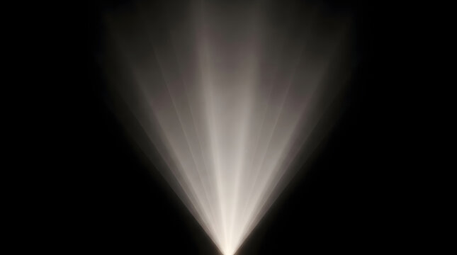 A bright white spotlight beam shining upwards against a dark black background creating a dramatic theatrical lighting effect