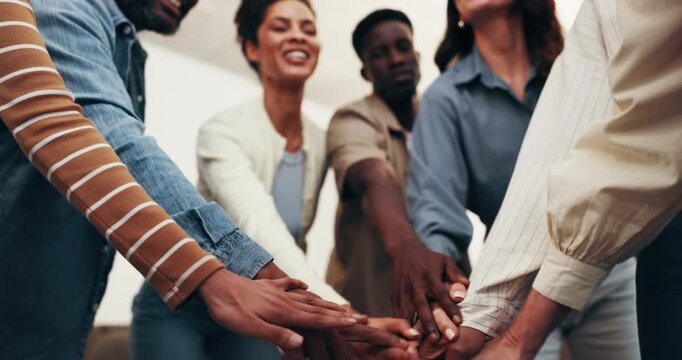 People, meeting and celebration with hands together for collaboration, mission or teamwork. Group, employees or community piling with smile, trust or stack for unity, solidarity or social cohesion