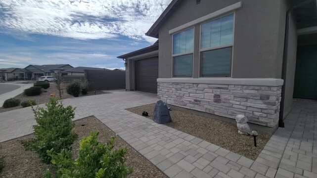 Modern suburban house with stone facade
