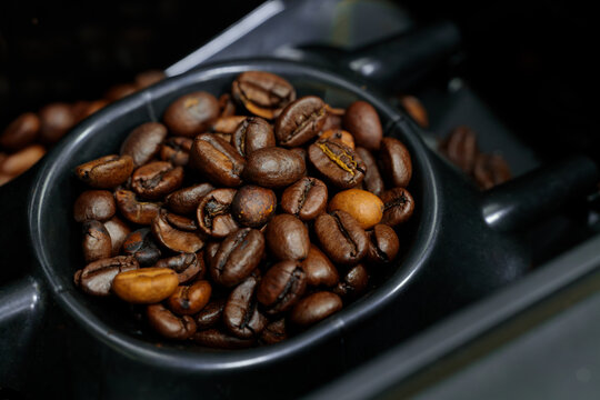 coffee beans detailed macro rich texture and deep brown color of freshly roasted highlighting their natural pattern and aroma
