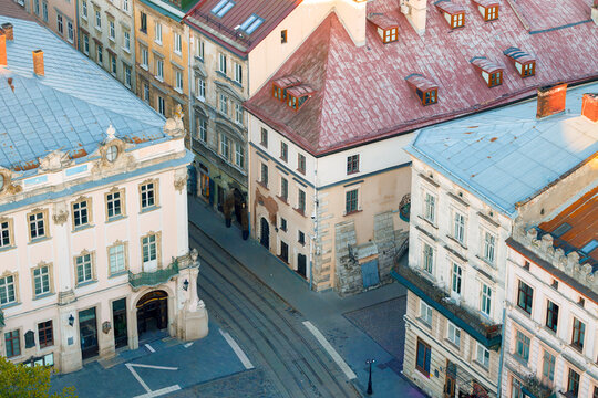 Aerial view of an old European town square with cobblestone streets and historic buildings city center
