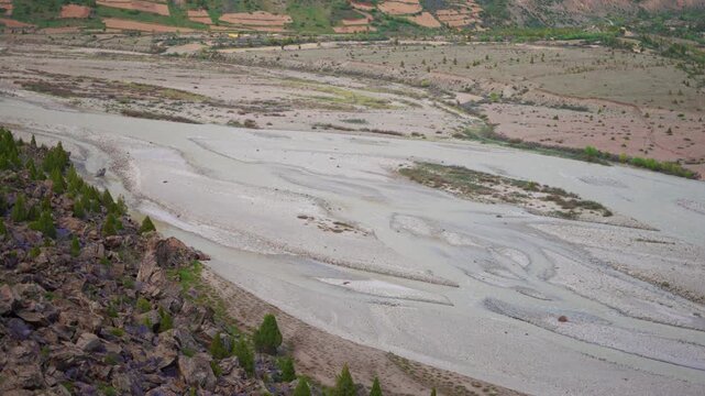 4K Closeup shot of river bed of Bhaga River flowing during the summer season as seen from Darcha village in Lahaul and Spiti district, Himachal Pradesh, India. Scenic Himalayan mountain river.